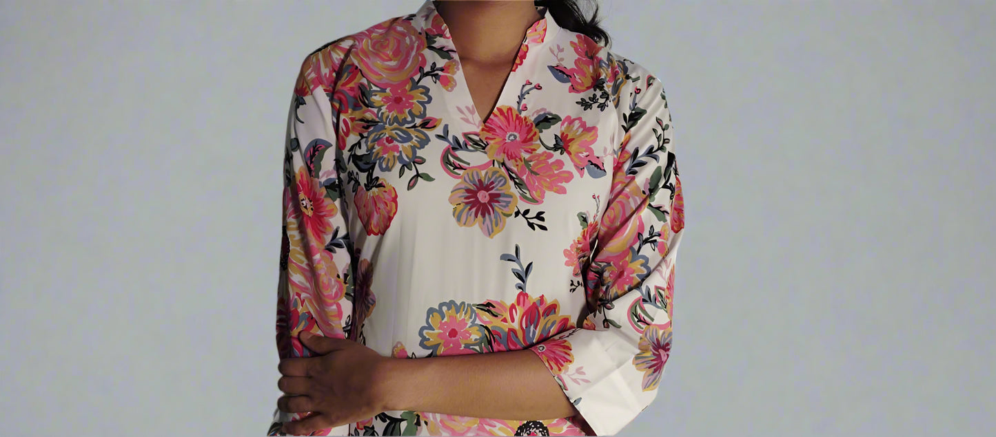 रंगीन अमूर्त पुष्प प्रिंट के साथ सफेद को-ऑर्ड सेट 